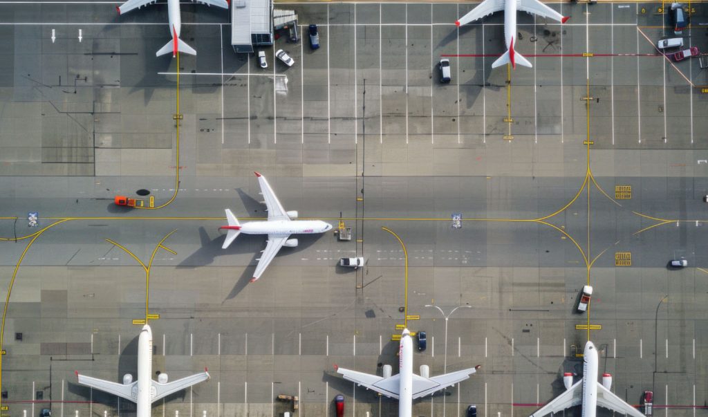 airplanes at terminal aerial view