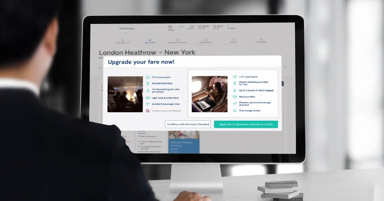 business man on computer looking at routehappy screen